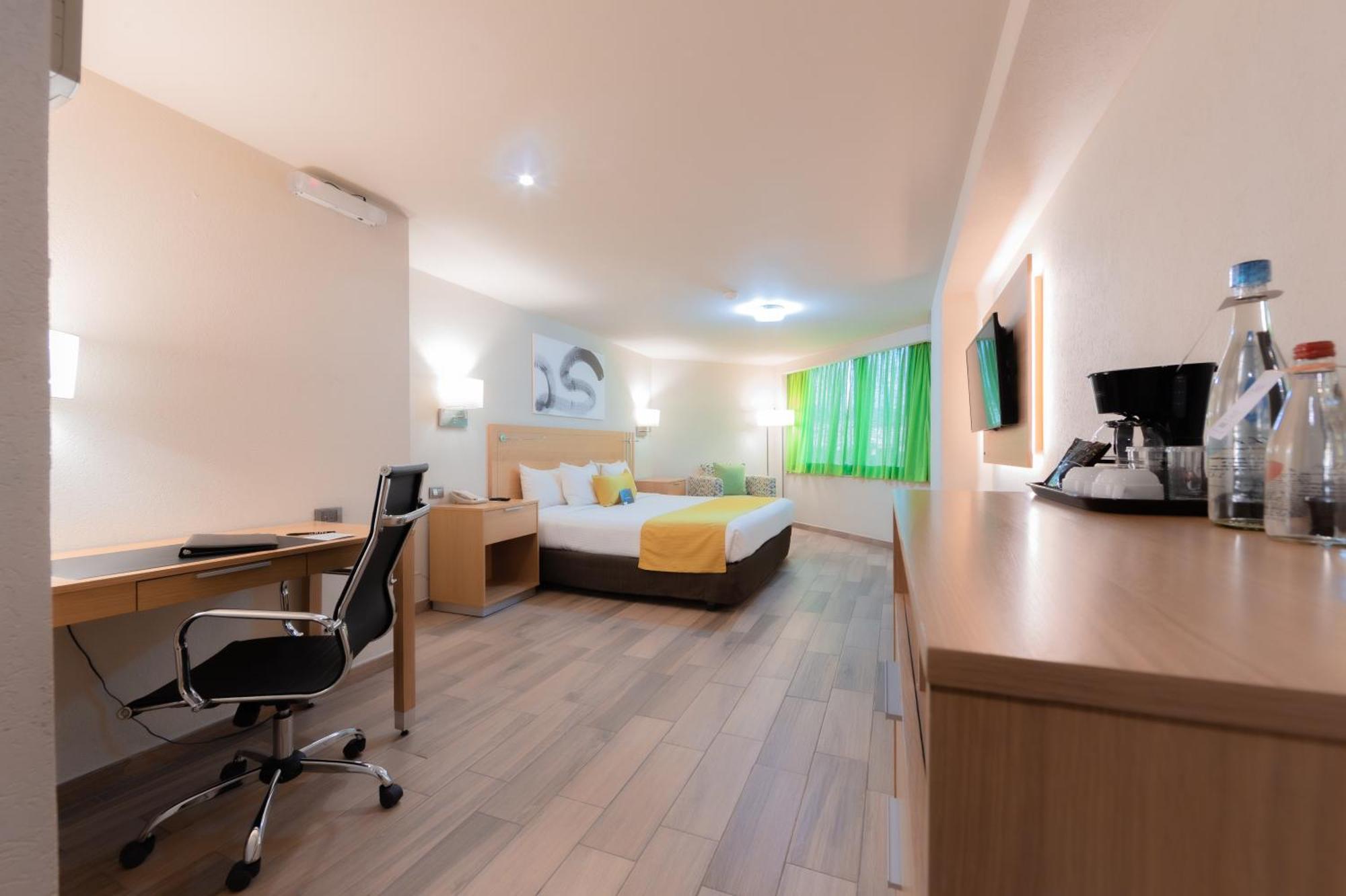 퀄리티 인 파추카 호텔 Pachuca 외부 사진 A typical room at the hotel